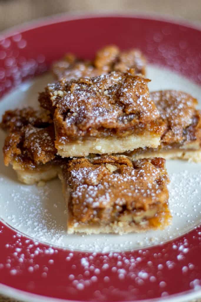 Pecan pie bars on a plate.