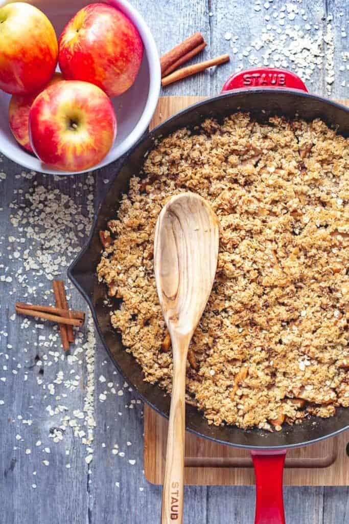 Apple vrispy in cast iron skillet ready to served for a fall brunch.