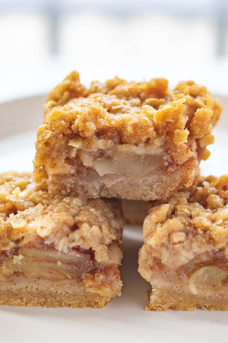 Apple pie bars for an easy Thanksgiving dessert on a white plate.