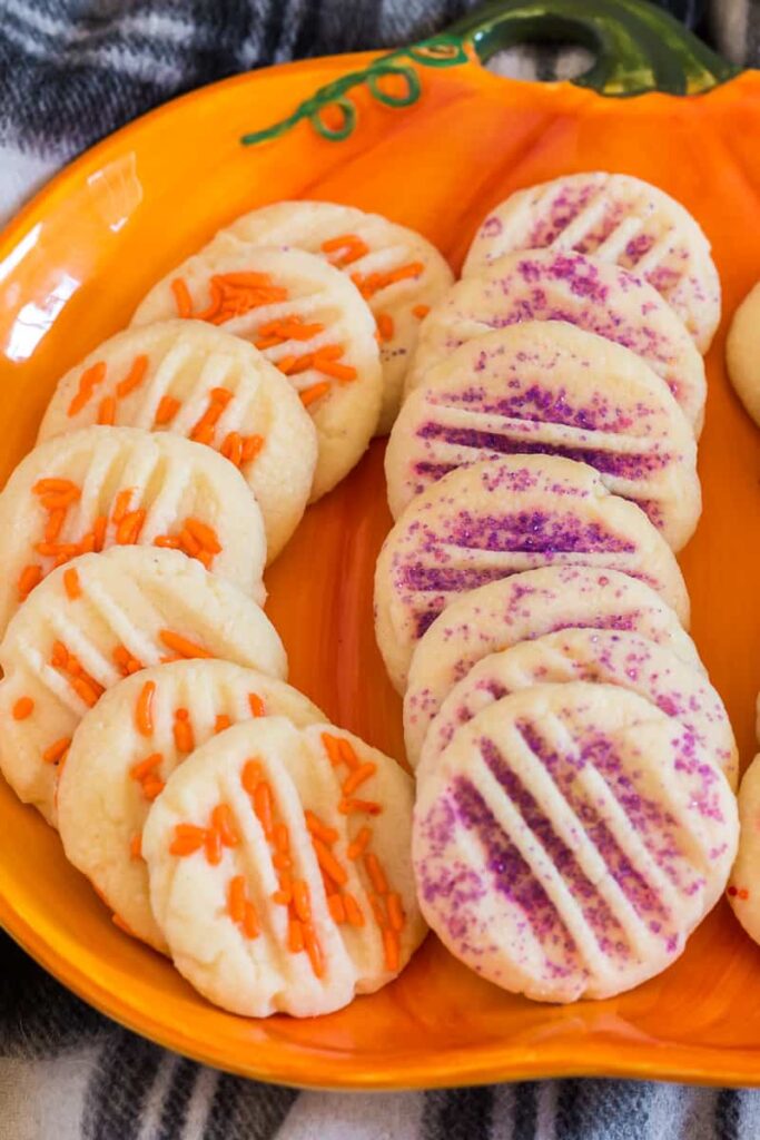Halloween shortbread cookies on pumpkin decorative plate,