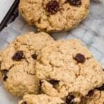 Almond flour oatmeal raisin cookies on wire cooling rack.