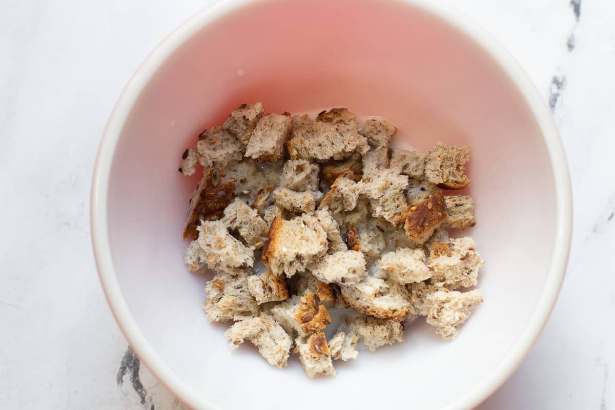 Fresh breadcrumbs in a small bowl.