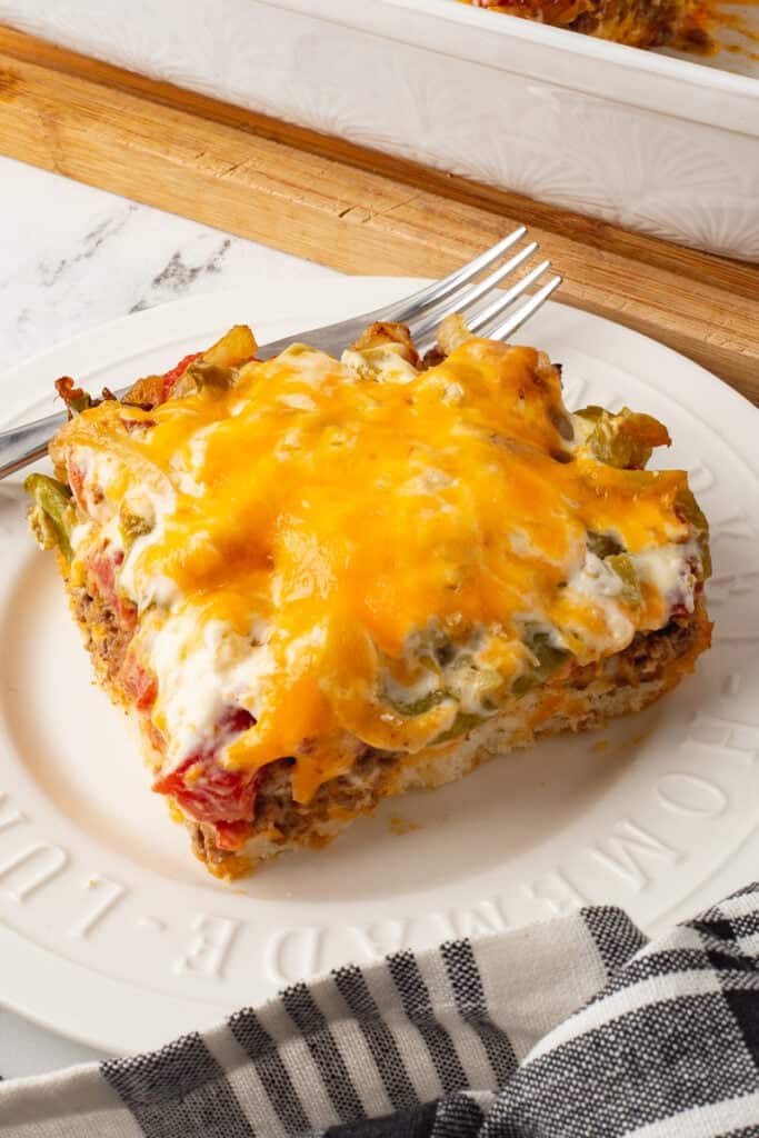 John Wayne casserole with bisquick mix on a white plate.