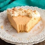 Pumpkin mousse pie on a white plate.