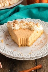 Pumpkin mousse pie on a white plate.