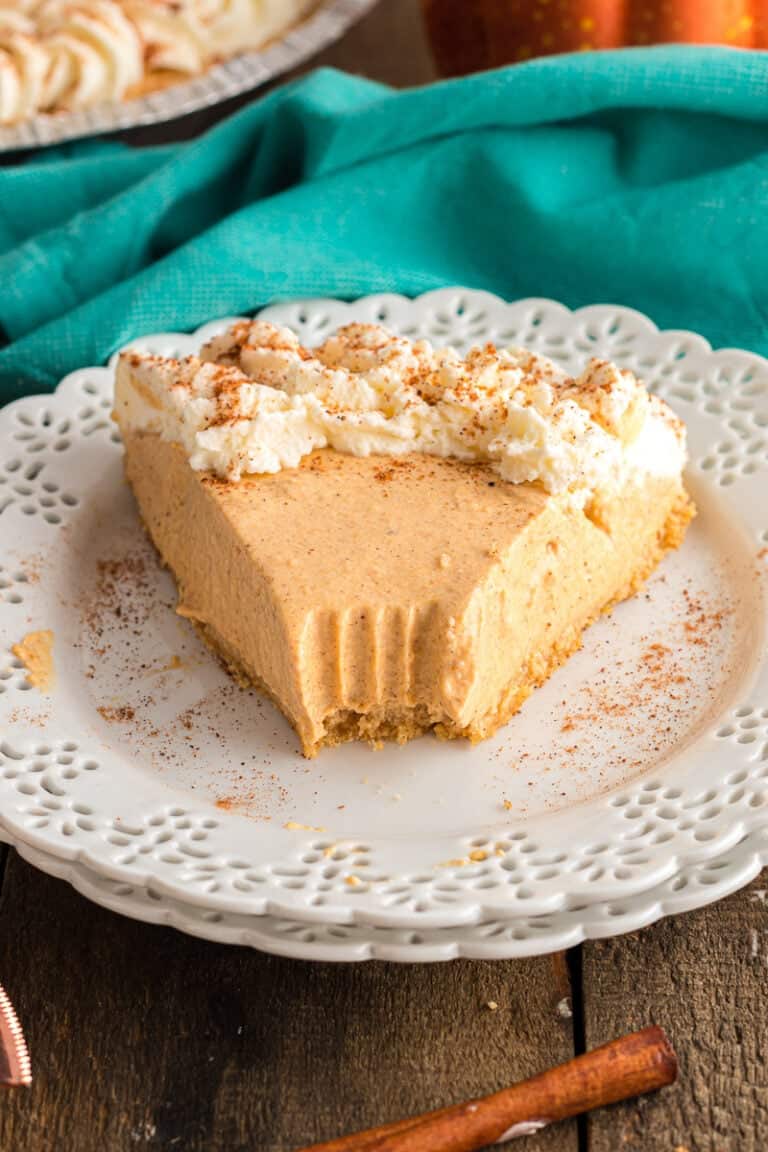 Pumpkin mousse pie on a white plate.