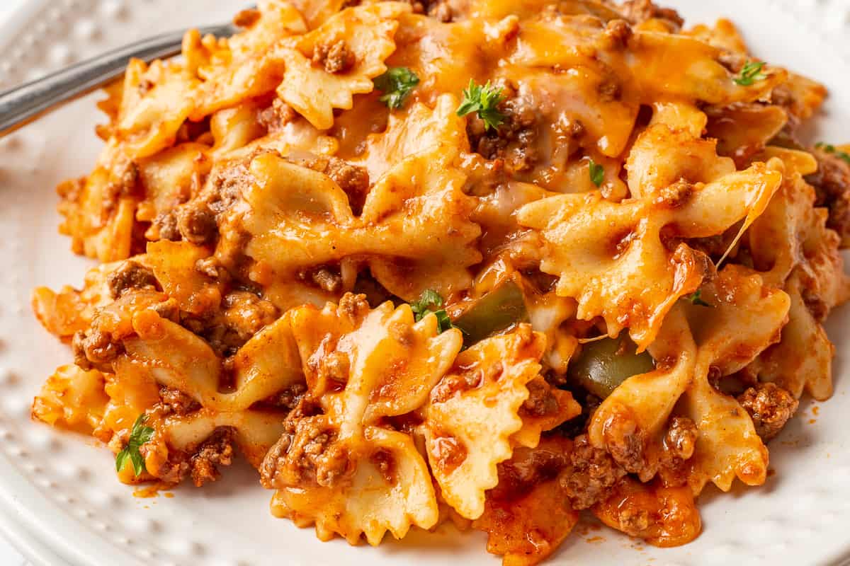 Sloppy Joe Casserole on a white palte with a fork.