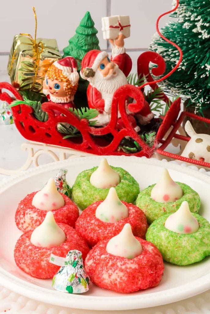 Hershey kiss sugar cookies on a white plate.