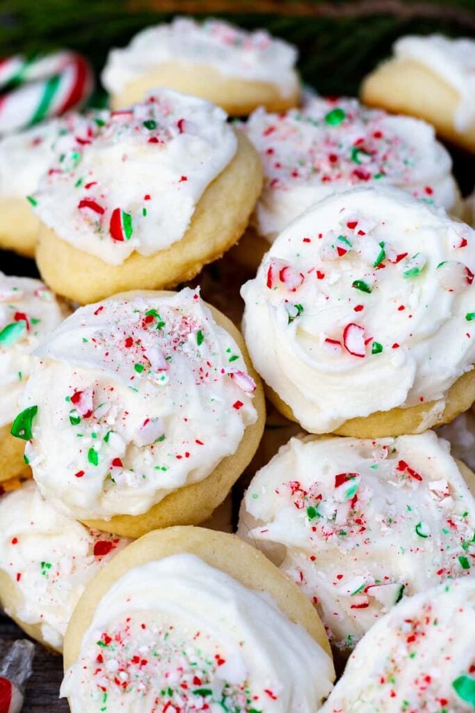Christmas peppermint meltaway cookies on a red plate.