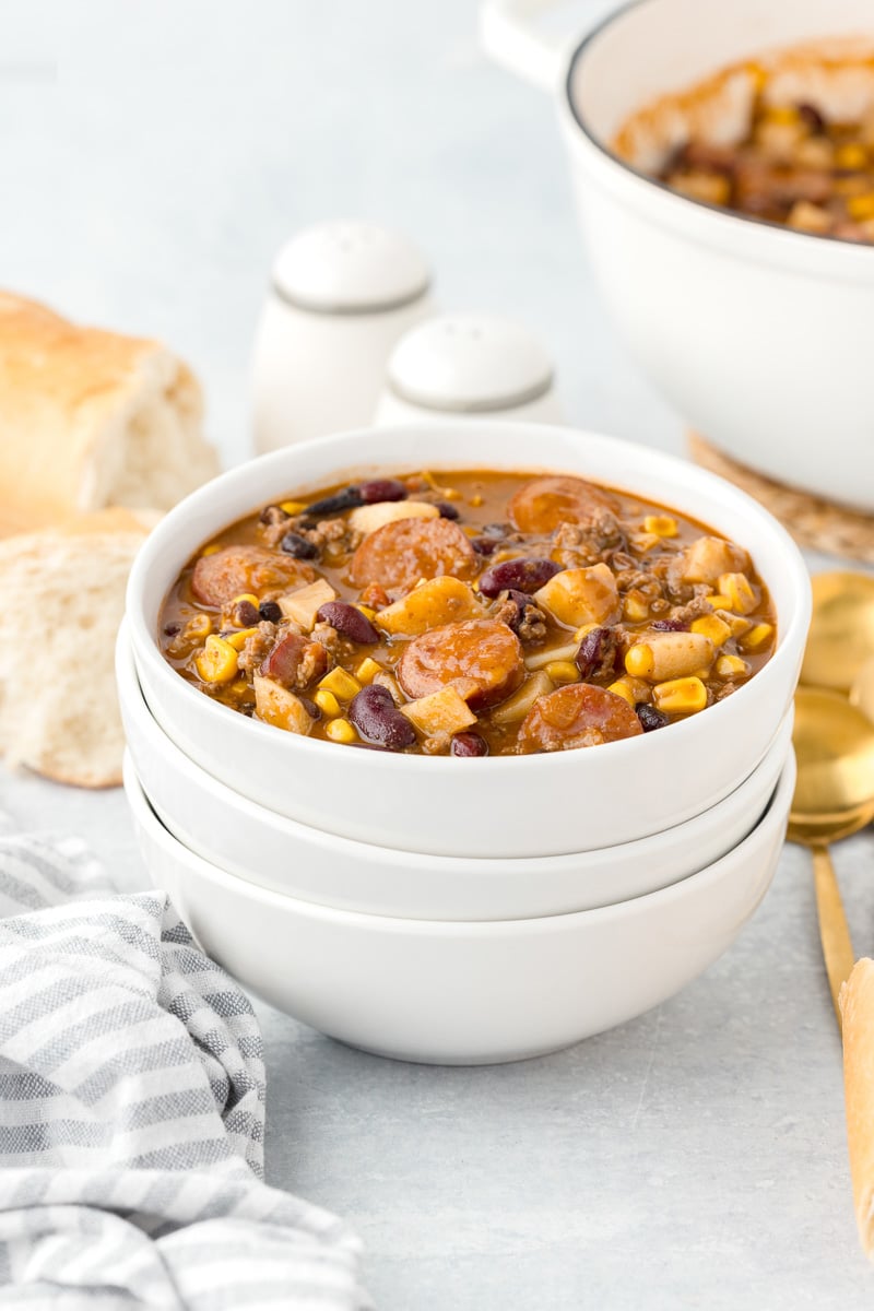 Texas cowboy stew in white bowls.