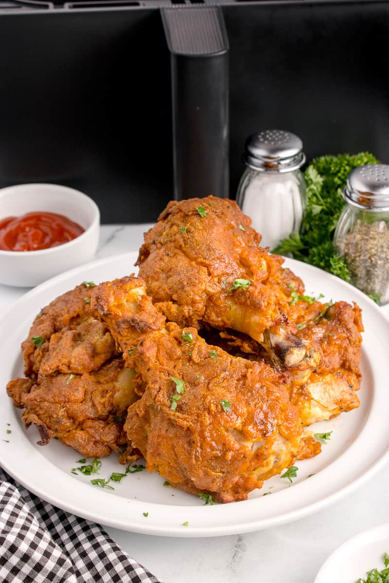 Air fried crispy fried chicken on white plate.