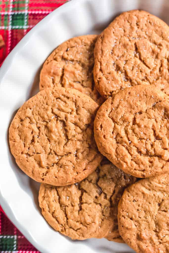 Gingersnap cookies on a white plate.