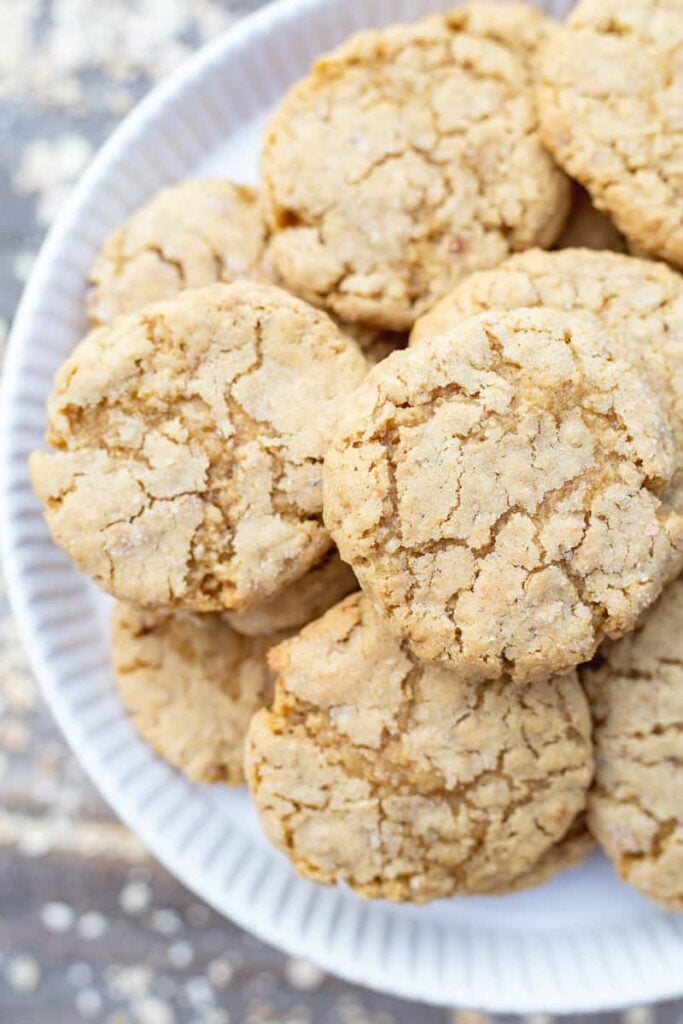 Oatmeal cookies on a white plate.