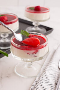 Panna cotta in glass dish.