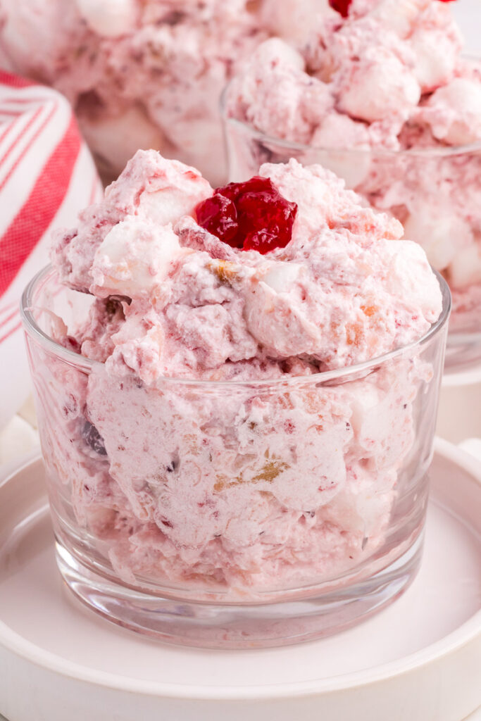 Cranberry fluff salad in a glass bowl for Thanksgiving.
