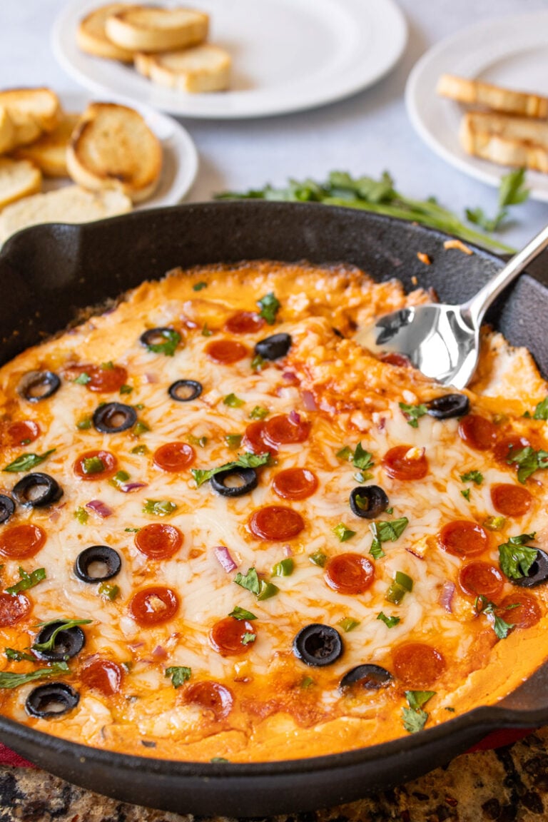 Pizza dip in cast iron skillet.