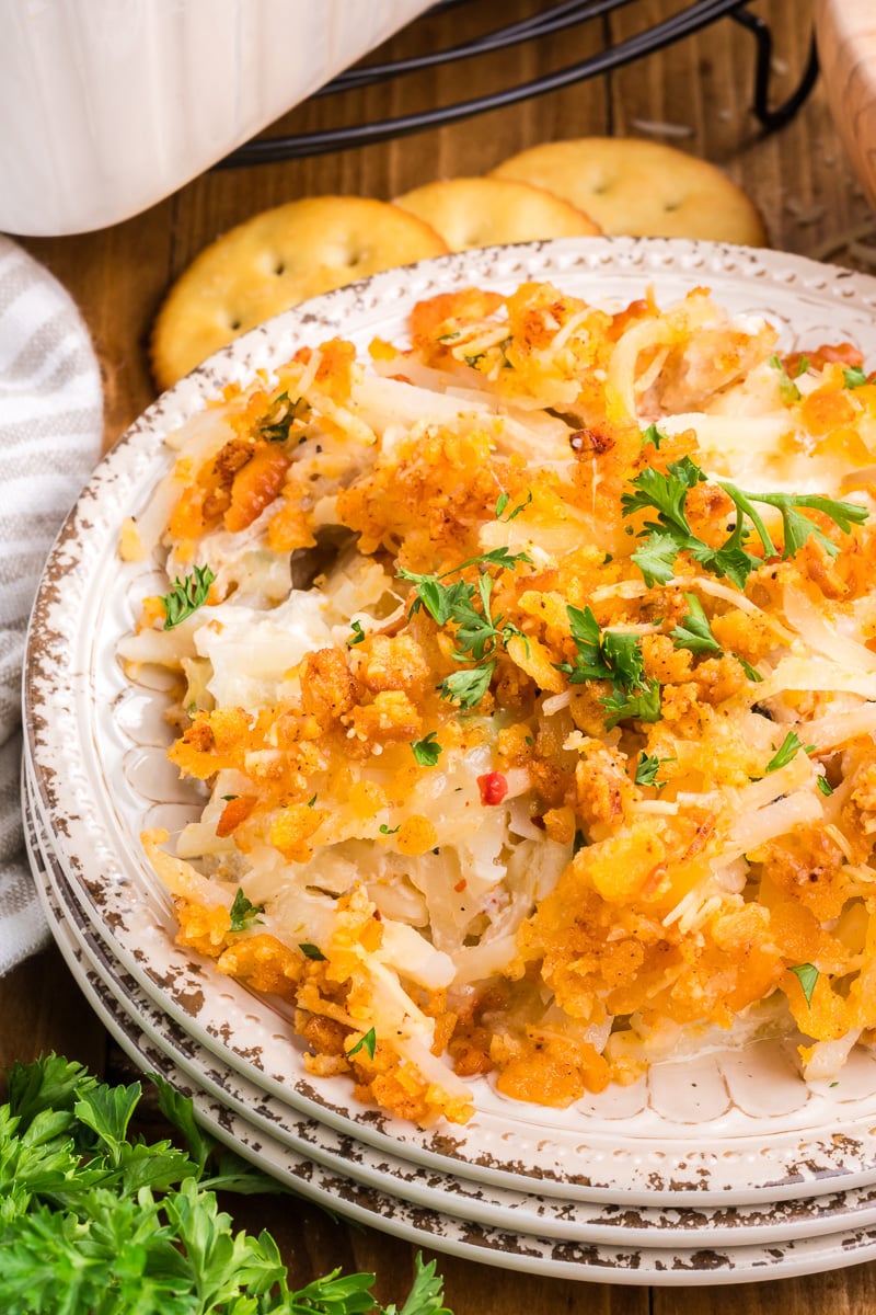 Hashbrown chicken casserole on a white plate.