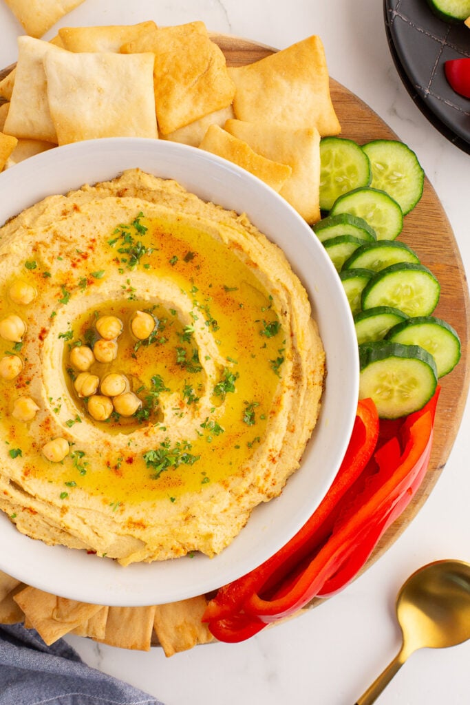 Hummus in white bowl.