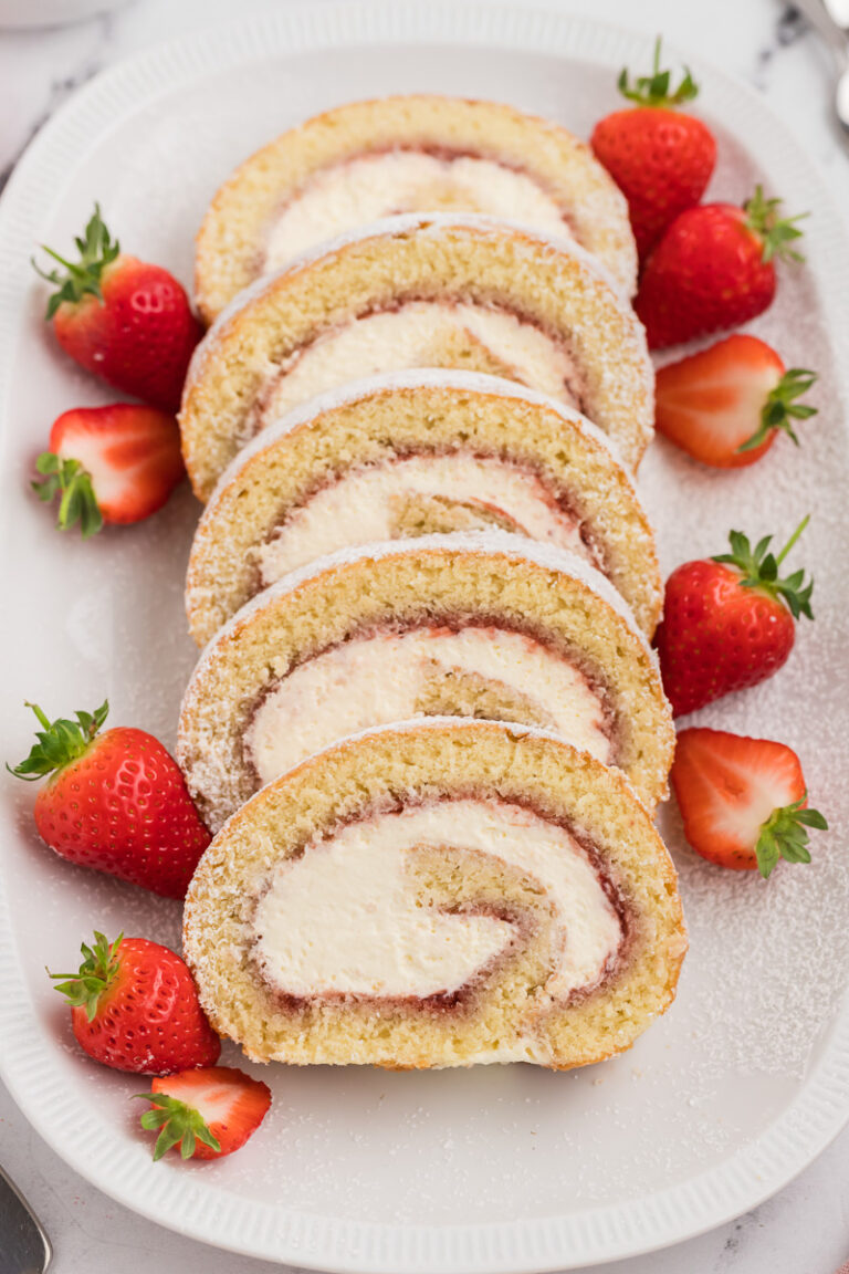Strawberries & Cream Swiss Roll Recipe | She's Not Cookin'