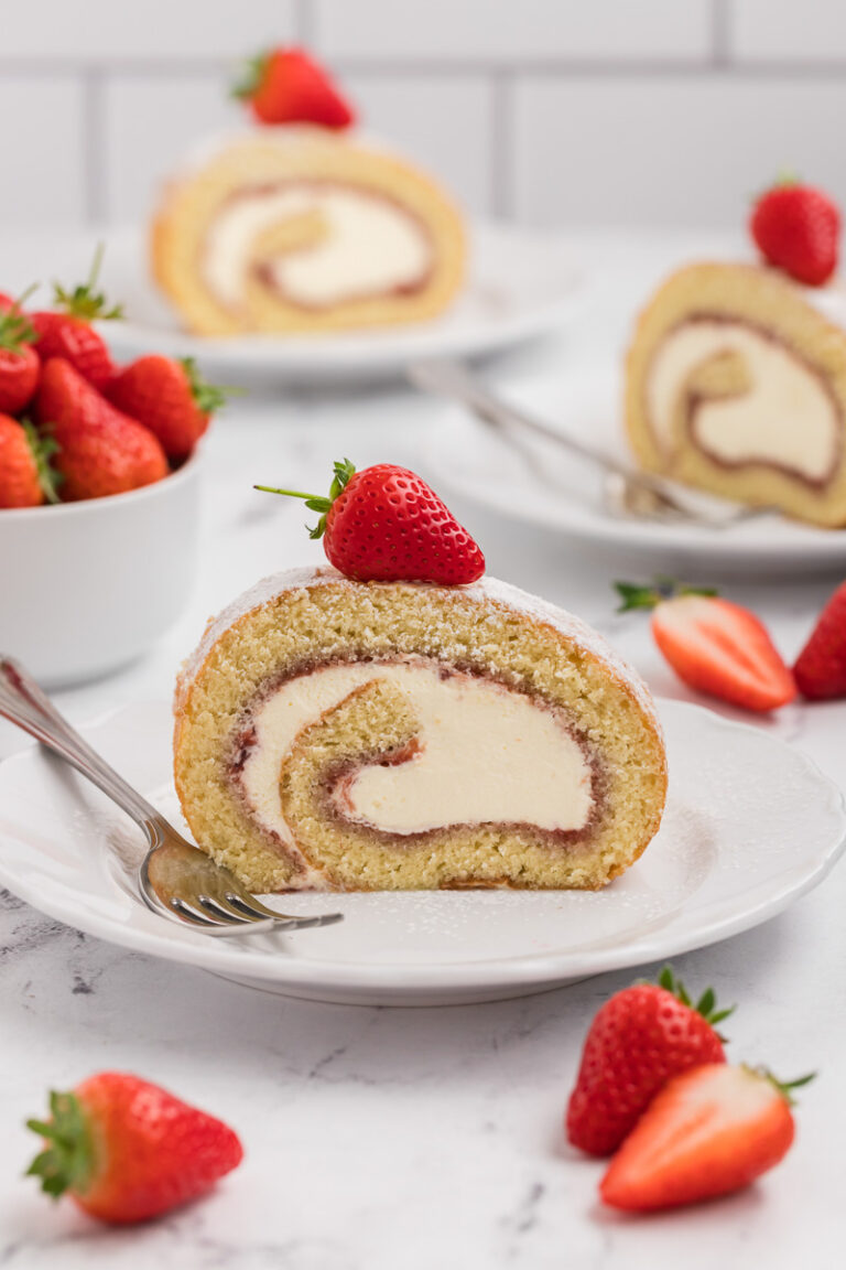 Strawberries & Cream Swiss Roll Recipe | She's Not Cookin'