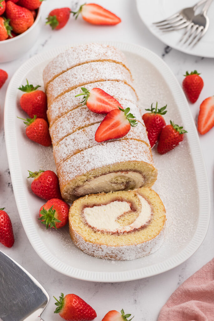 Strawberries & Cream Swiss Roll Recipe | She's Not Cookin'