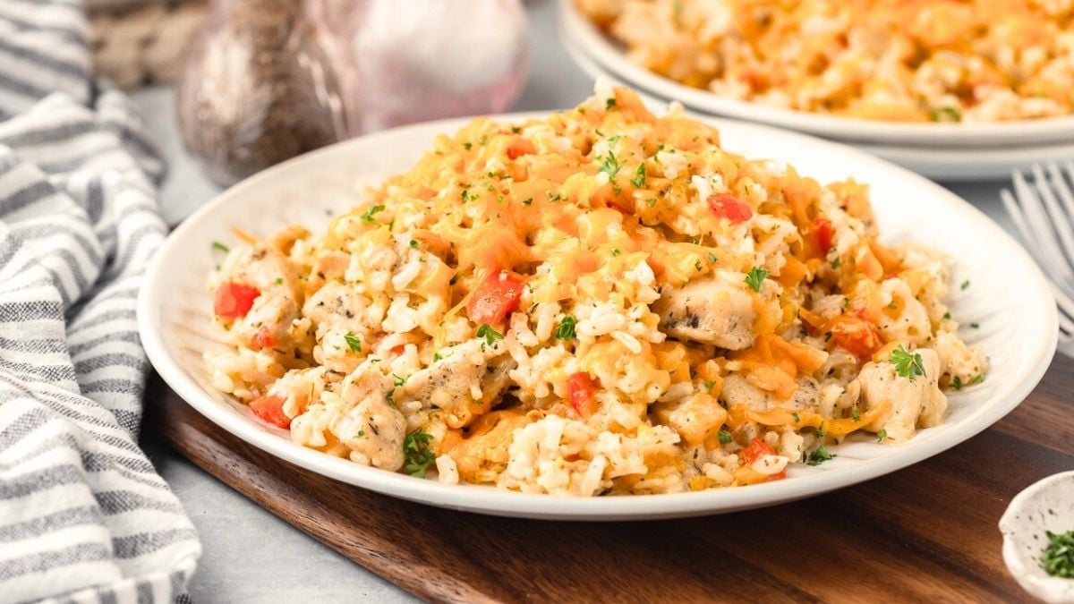 Cheesy chicken and rice casserole served on a plate.