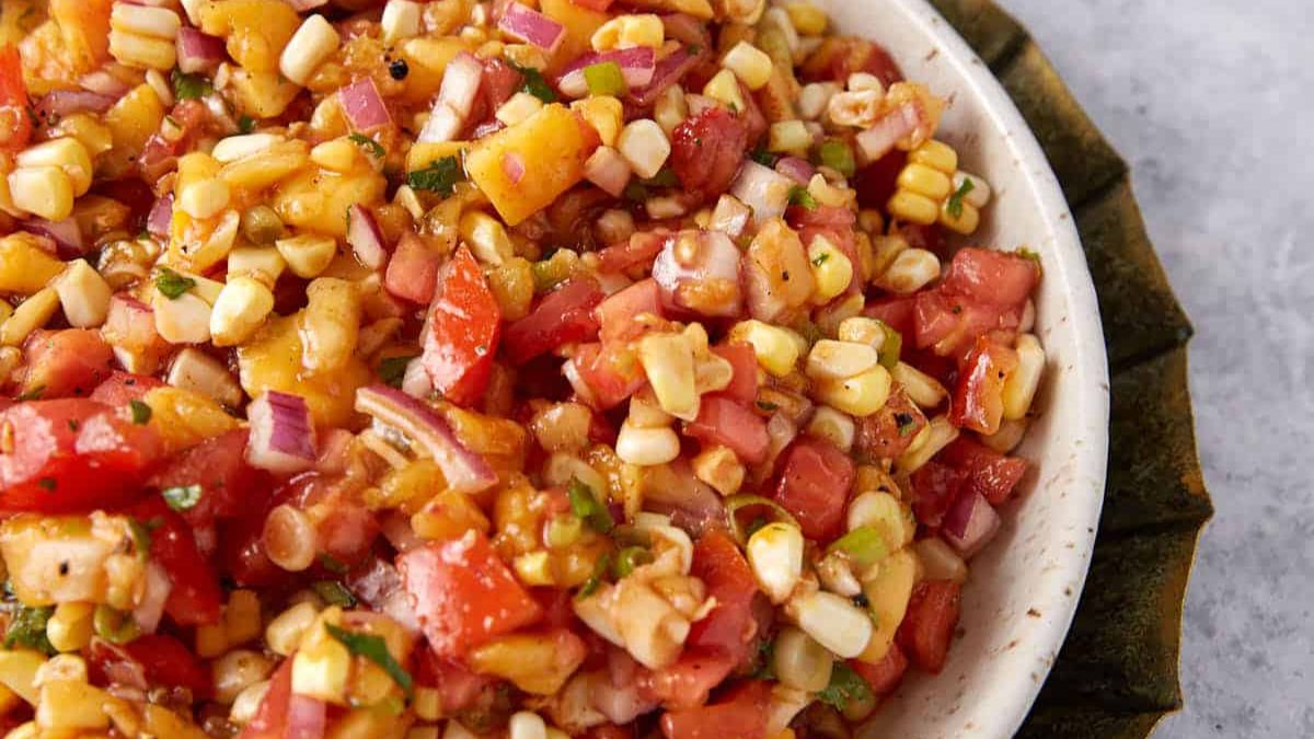 Peach salsa in a small bowl.