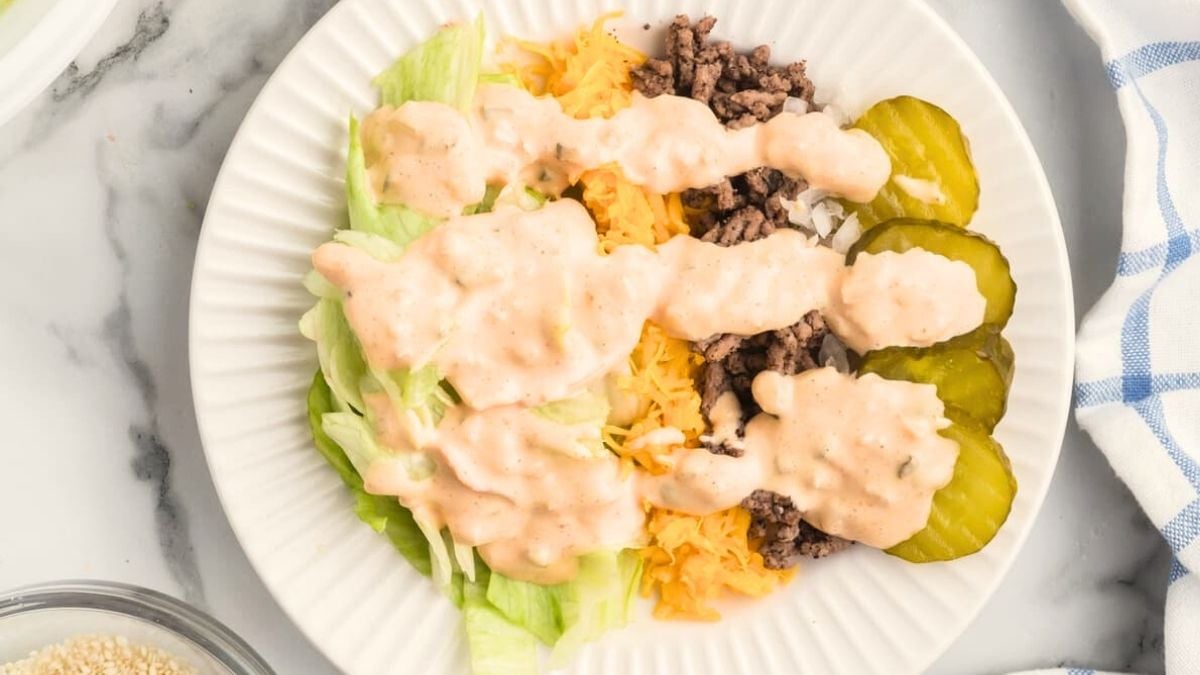 Big Mac salad served on a white plate.