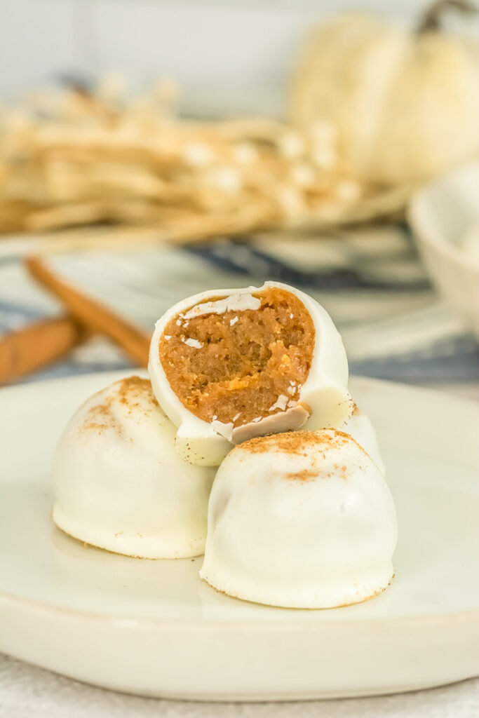 Pumpkin cake balls on a plate.