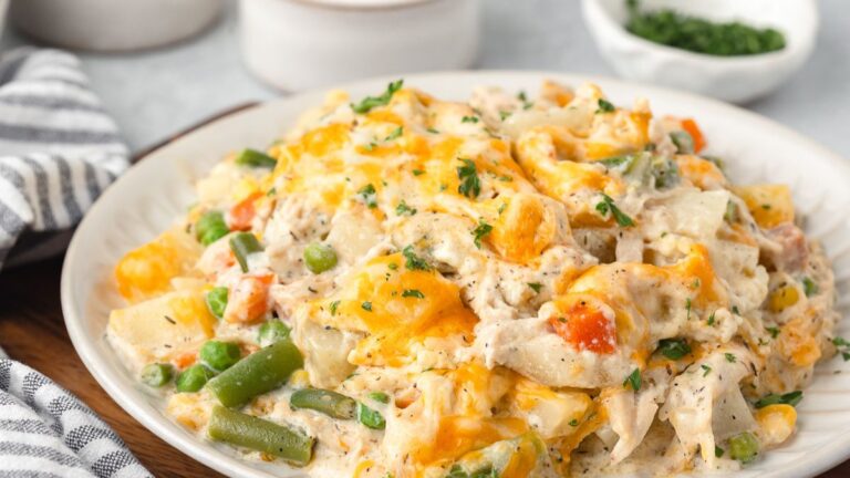 Chicken and potato casserole on a white plate.