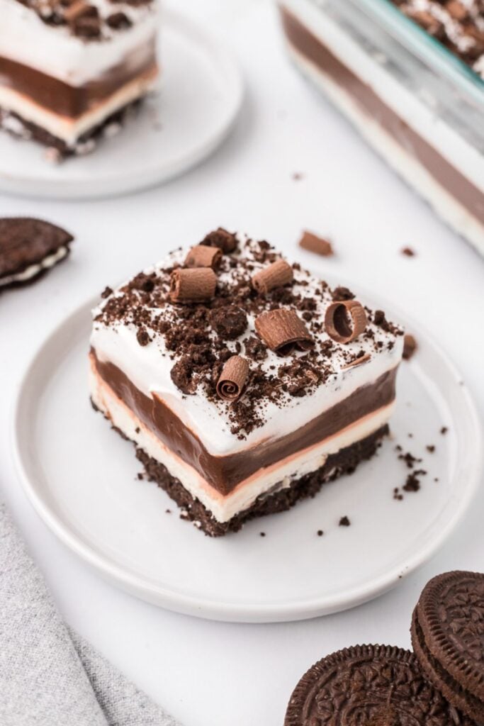 No bake chocolate delight served on a white plate.
