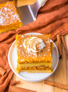 Pumpkin Gooey Butter Cake | She's Not Cookin'