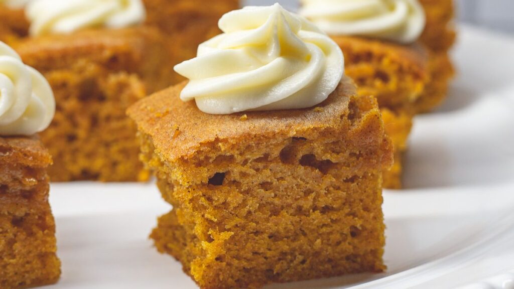 Pumpkin bars on a white plate.