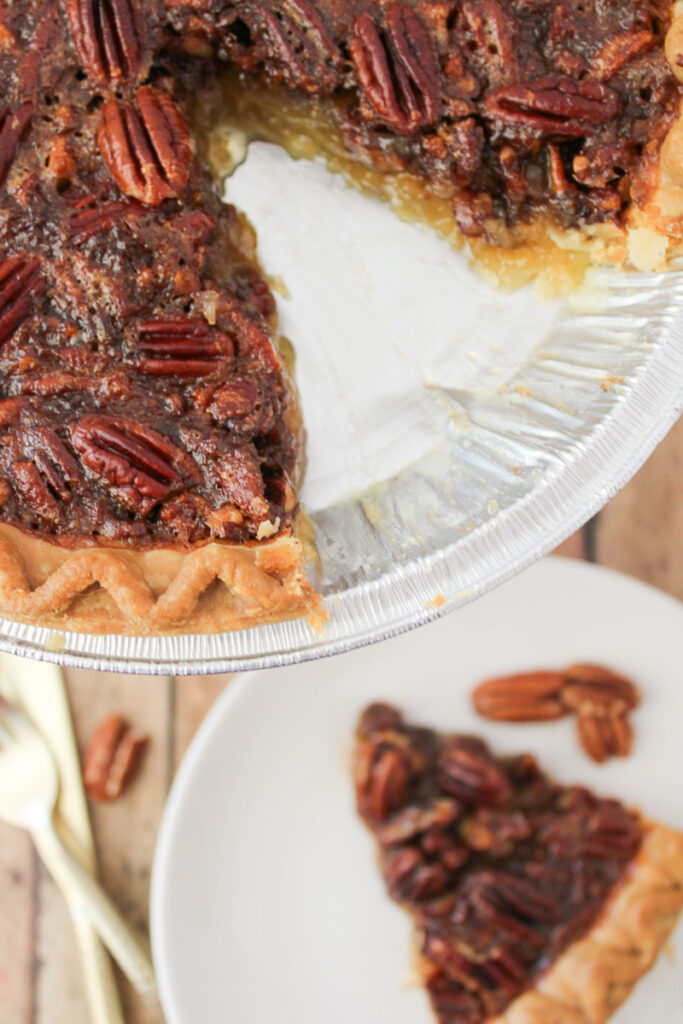 Brown butter pecan pie on a plate.