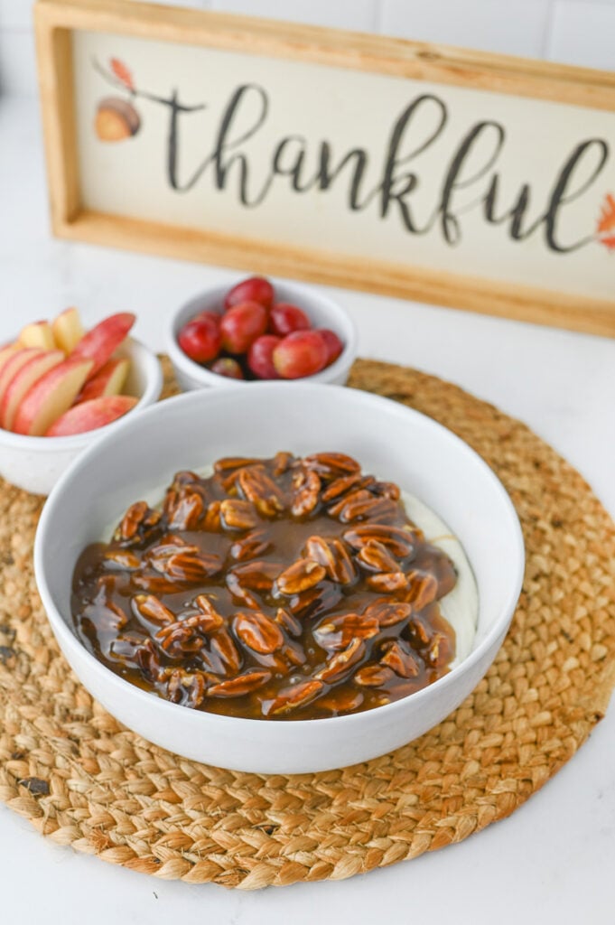 Pecan pie dip in a white bowl.