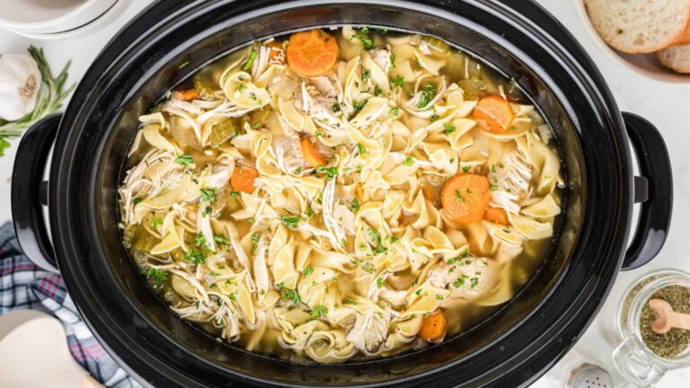 Chicken noodle soup in slow cooker.