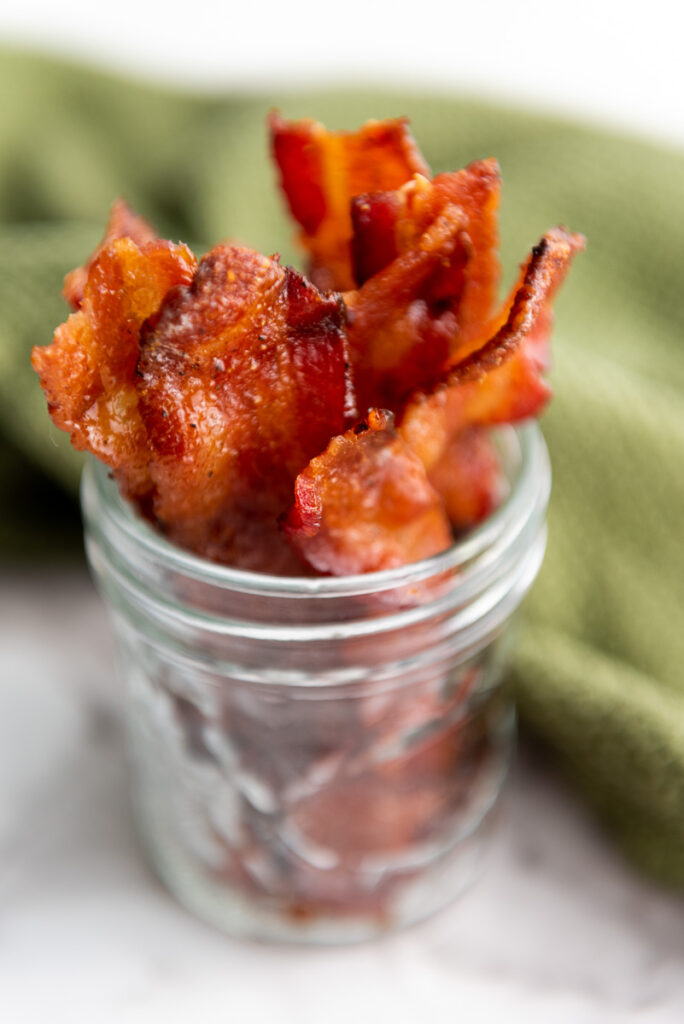Candied bacon in mason jar.