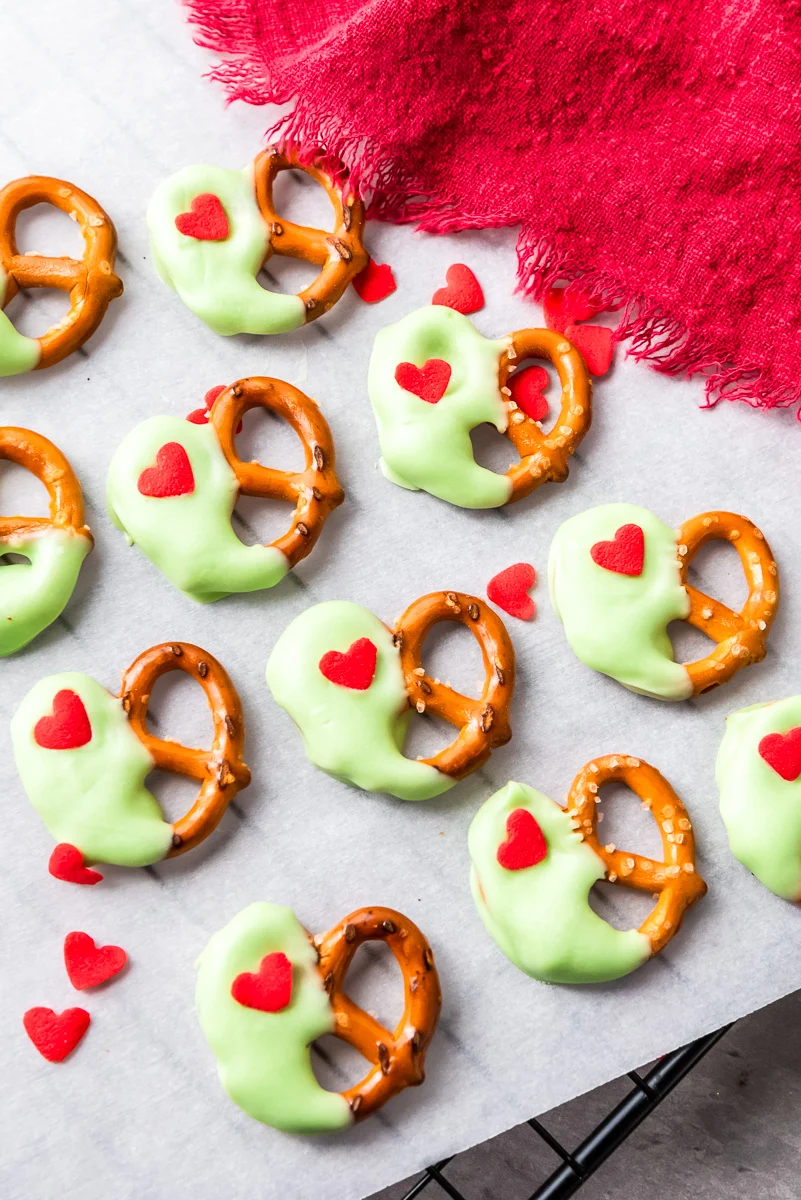Grinch pretzel bites arranged on a platter.