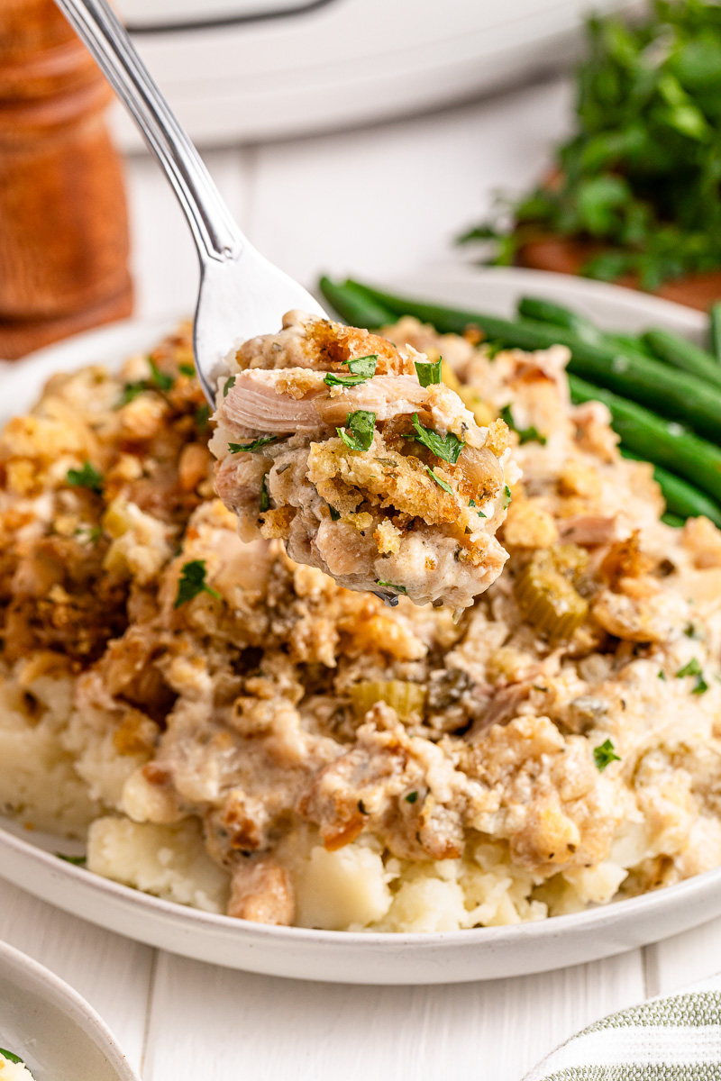 Crockpot chicken and stuffing casserole on a white plate.