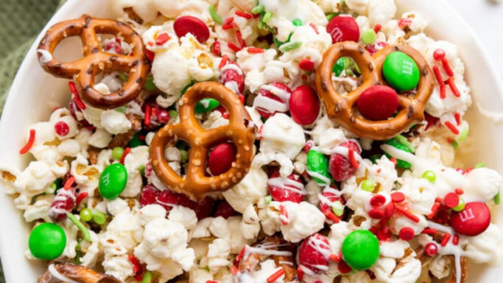 Christmas popcorn in a white bowl.