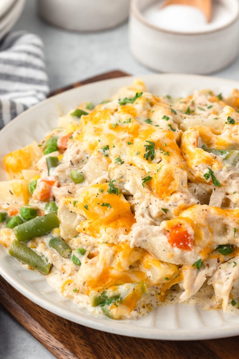 Chicken and potato casserole on a white plate.