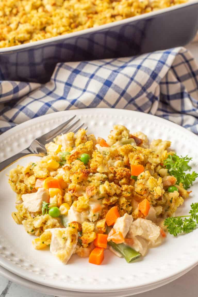 Chicken and stuffing casserole on a white plate.
