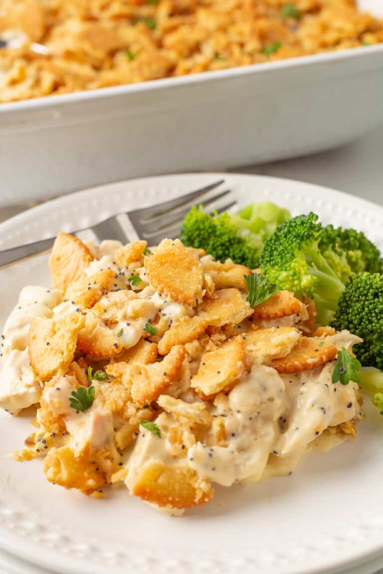 Poppy seed chicken casserole on a white plate.