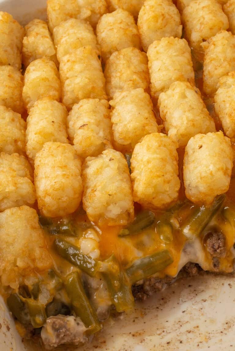 Green bean tater tot casserole in casserole dish.