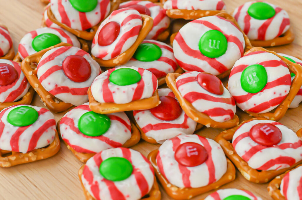 Peppermint pretzel bites on a chopping block.