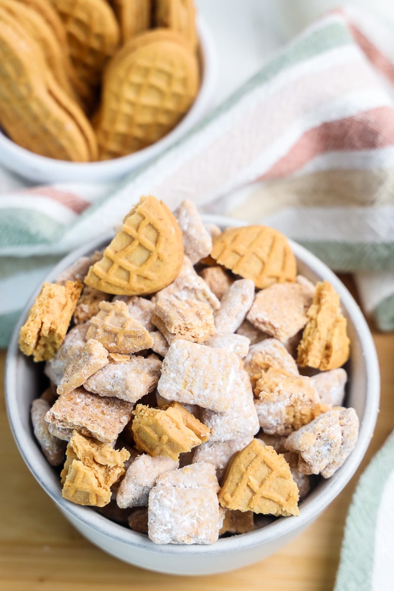 Nutter butter puppy chow in a white bowl.