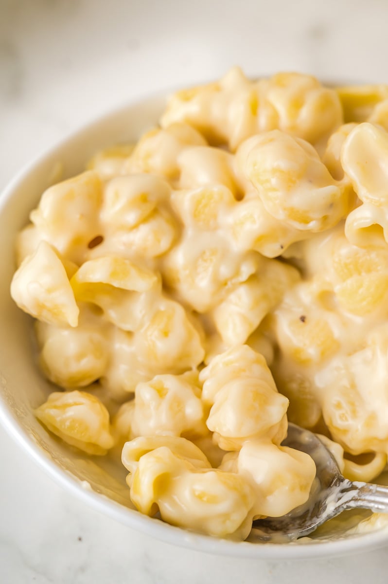 White cheddar mac and cheese in a white bowl.