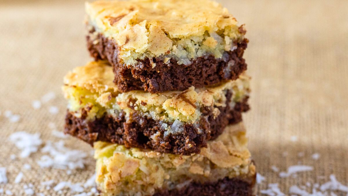 Chocolate coconut brownies on a plate.
