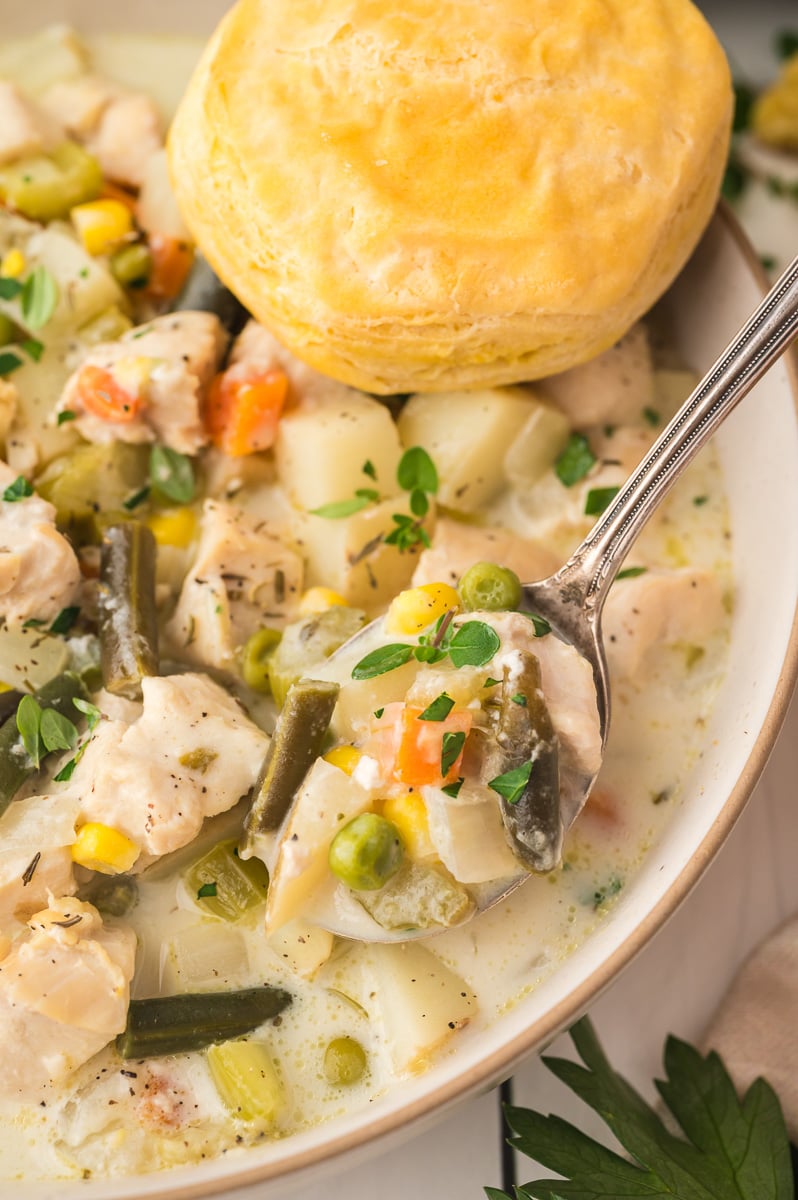 Spoonful o f chicken pot pie soup.