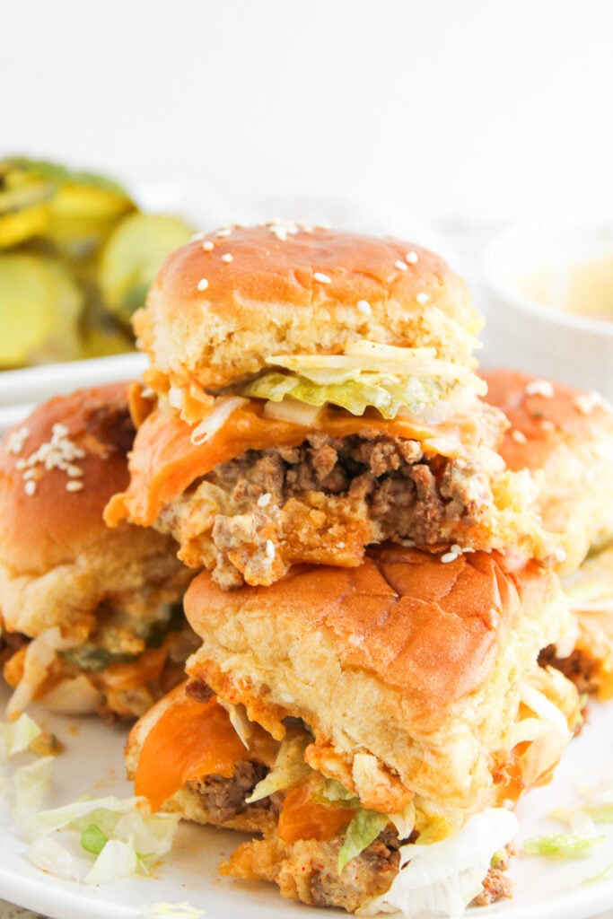 Big Mac sliders stacked on a plate.